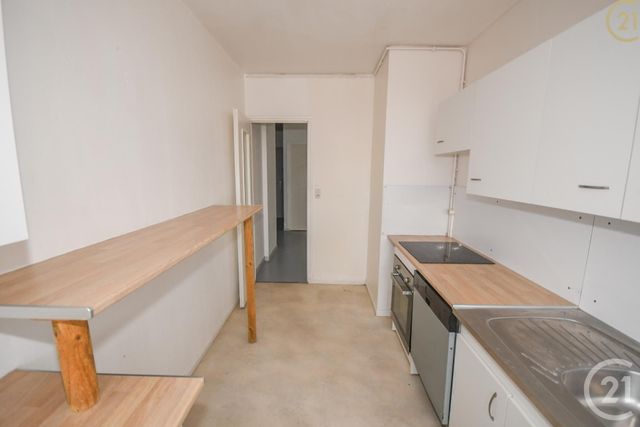 Afficher la photo en grand Appartement F4 à vendre - 5 pièces - 88.0 m2 - MAUBEUGE - 59 - NORD-PAS-DE-CALAIS - Century 21 Art-Immo
