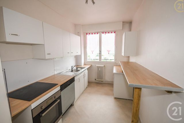 Afficher la photo en grand Appartement F4 à vendre - 5 pièces - 88.0 m2 - MAUBEUGE - 59 - NORD-PAS-DE-CALAIS - Century 21 Art-Immo