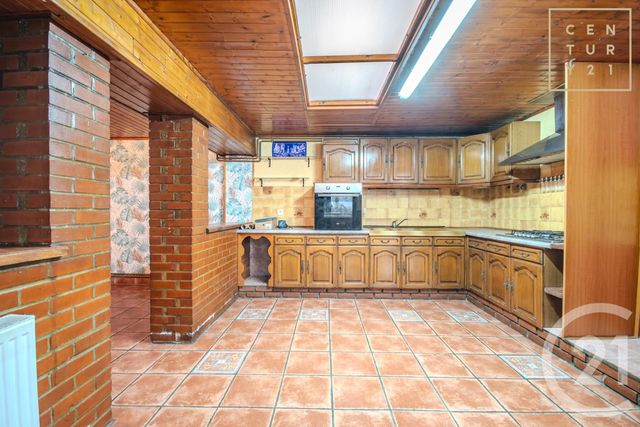 Afficher la photo en grand maison à vendre - 7 pièces - 139.0 m2 - HAUTMONT - 59 - NORD-PAS-DE-CALAIS - Century 21 Art-Immo